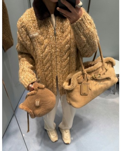 Twisted knitwear zip-up